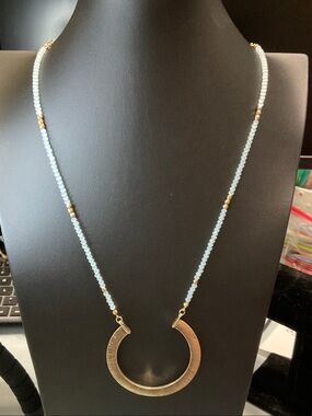 Gold Crescent Pendant Necklace with Pale Blue Beads